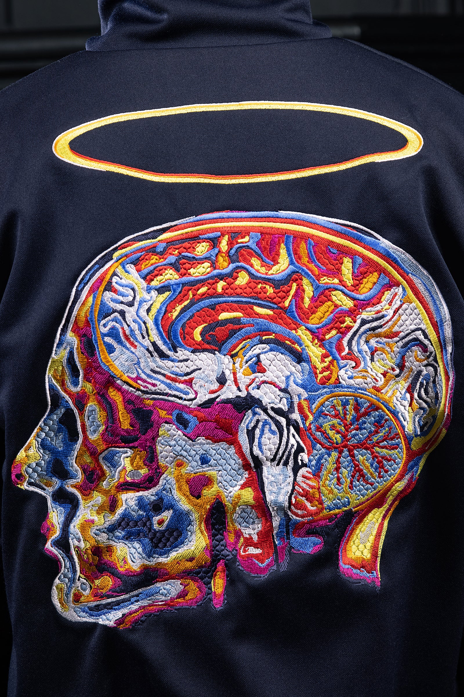 Multicolored skull face embroidery halo Man head handicraft Lima Peru