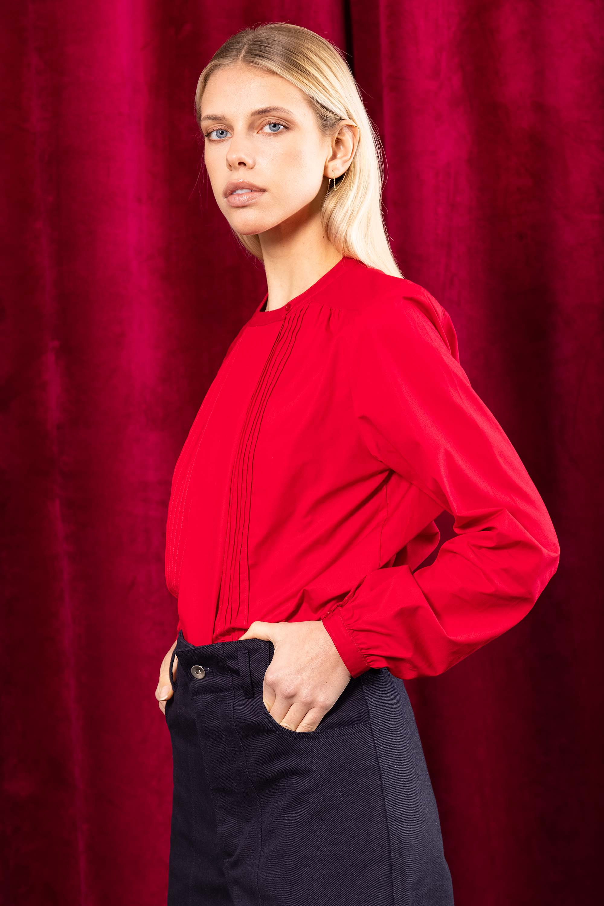 red shirt mandarin collar buttoned sleeves straight cut elegance softness femininity allure style design misericordia