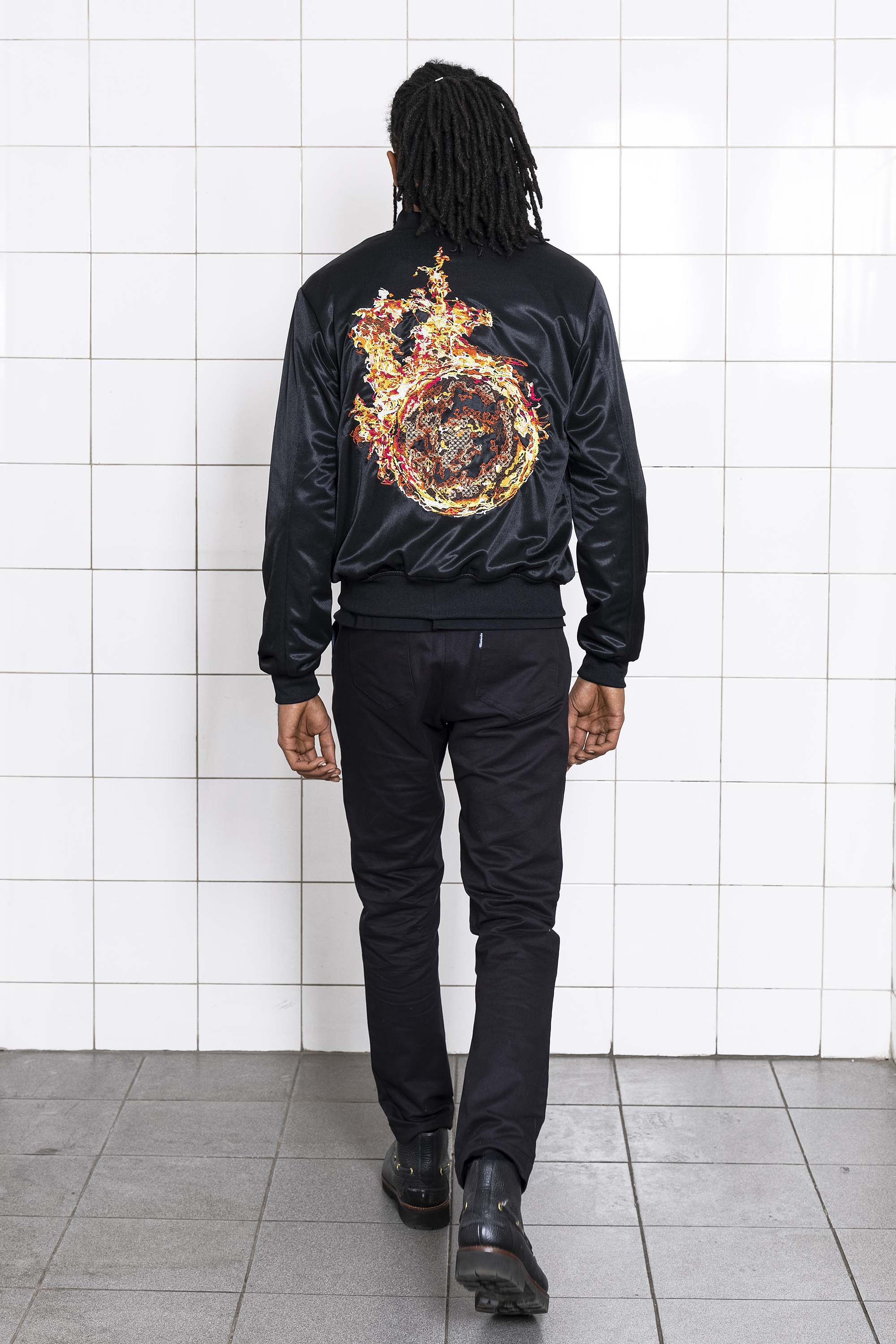 Souvenir polyester bomber jacket with fireball embroidery on the back and two front pockets