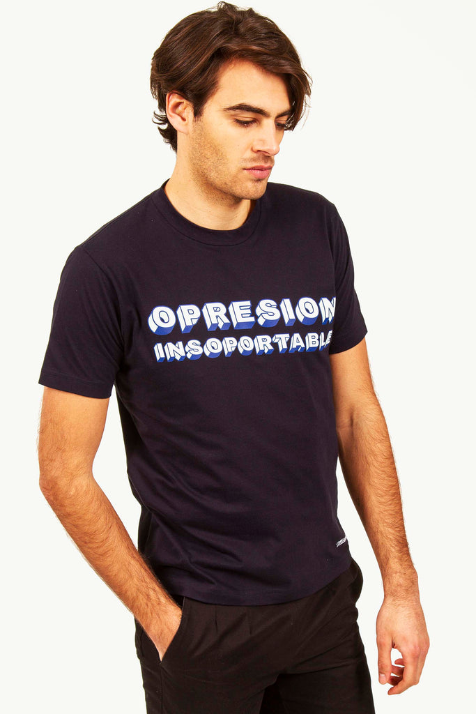 fashion opresion unwearable t-shirt on man looking down a better world committed message