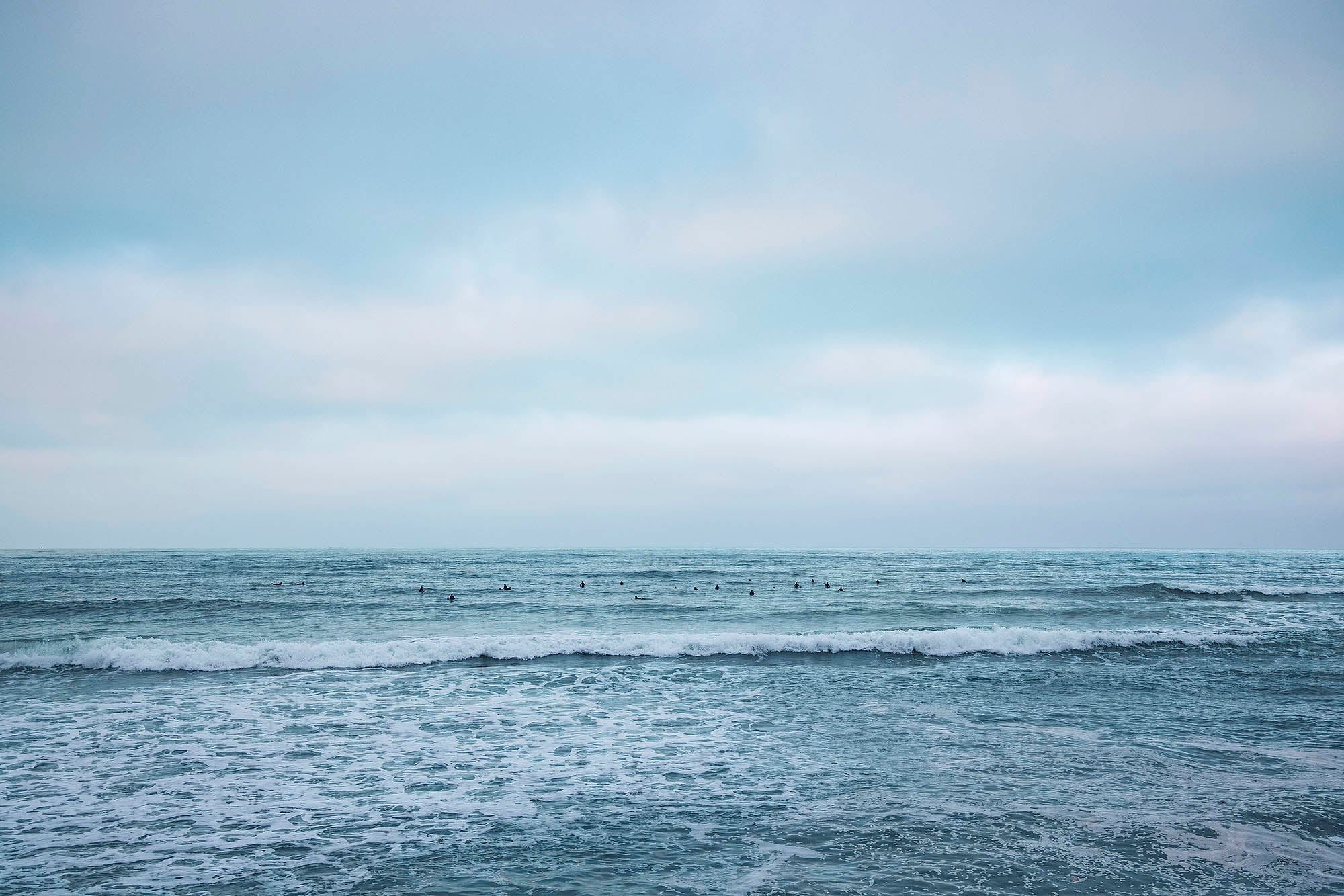 Landscape photography of the atlantic ocean with a wave coming onto the beach