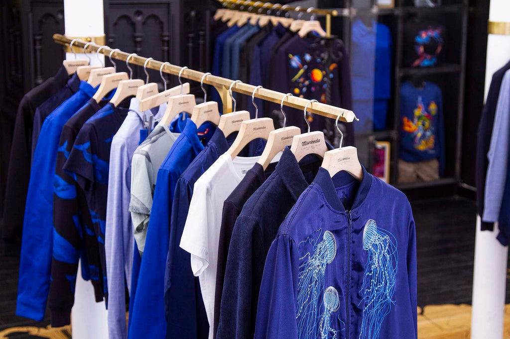 Interior of the rue Oberkampf boutique, featuring men's clothing embroidered with quality materials made in Peru