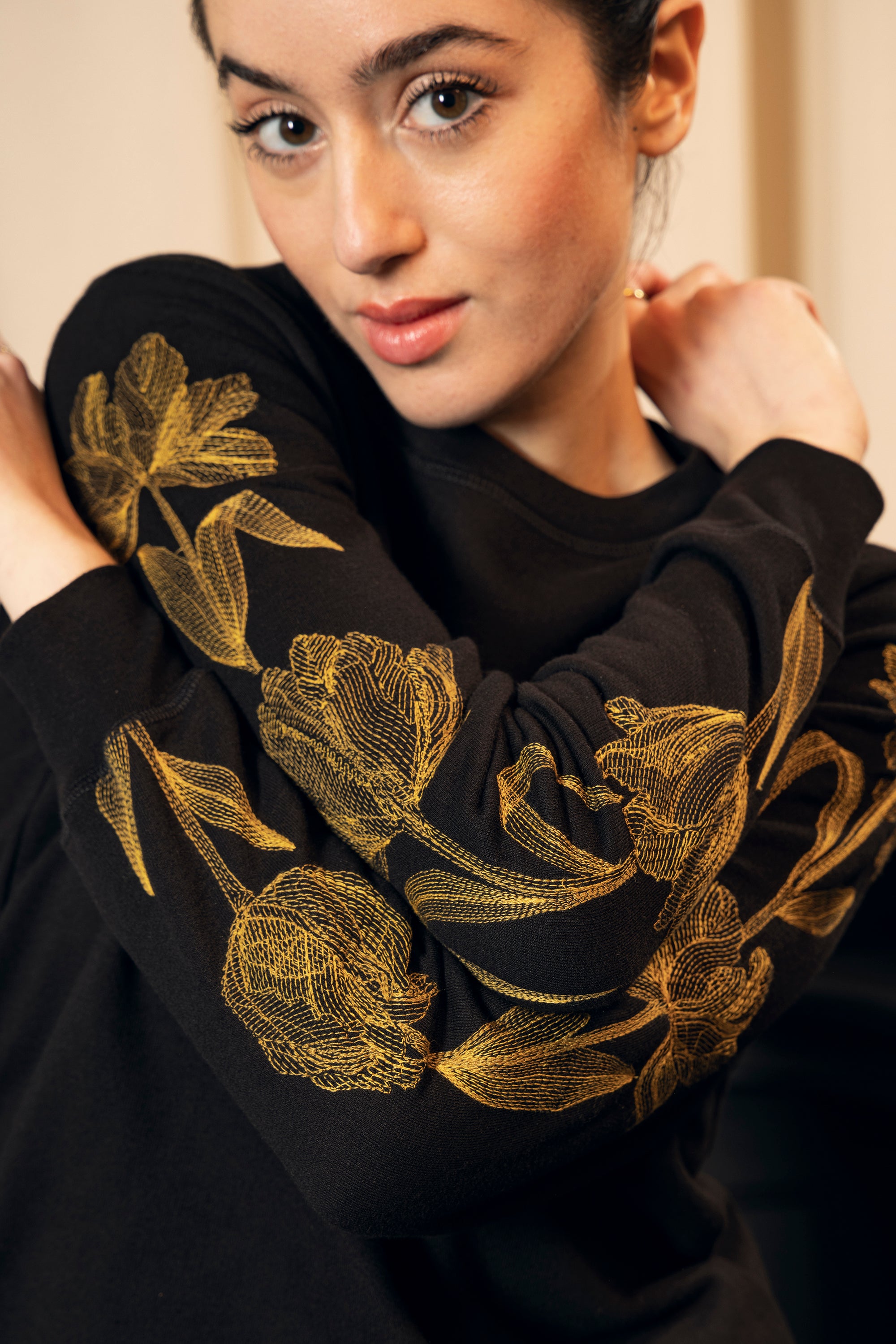 Black sweater embroidery golden flowers tulips magnolia stylish chic ethical fashion responsible Peru