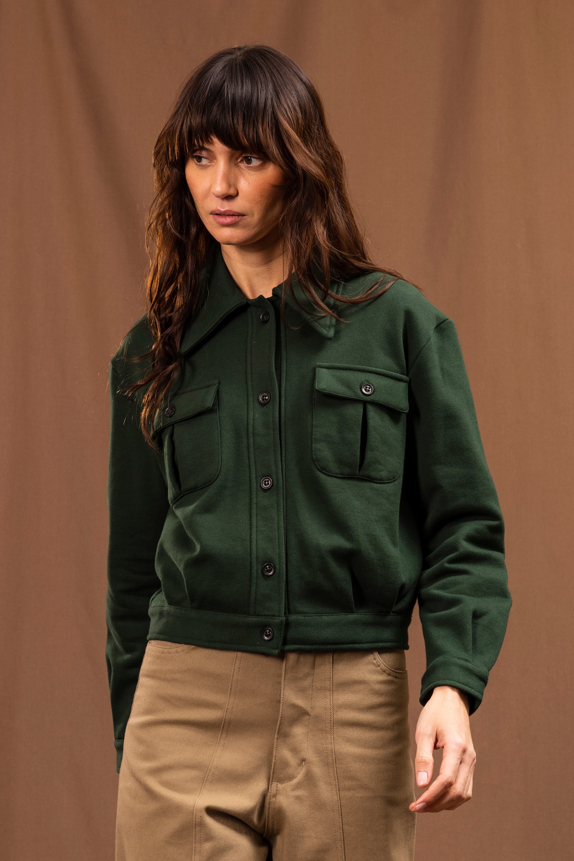 short dark green safari jacket