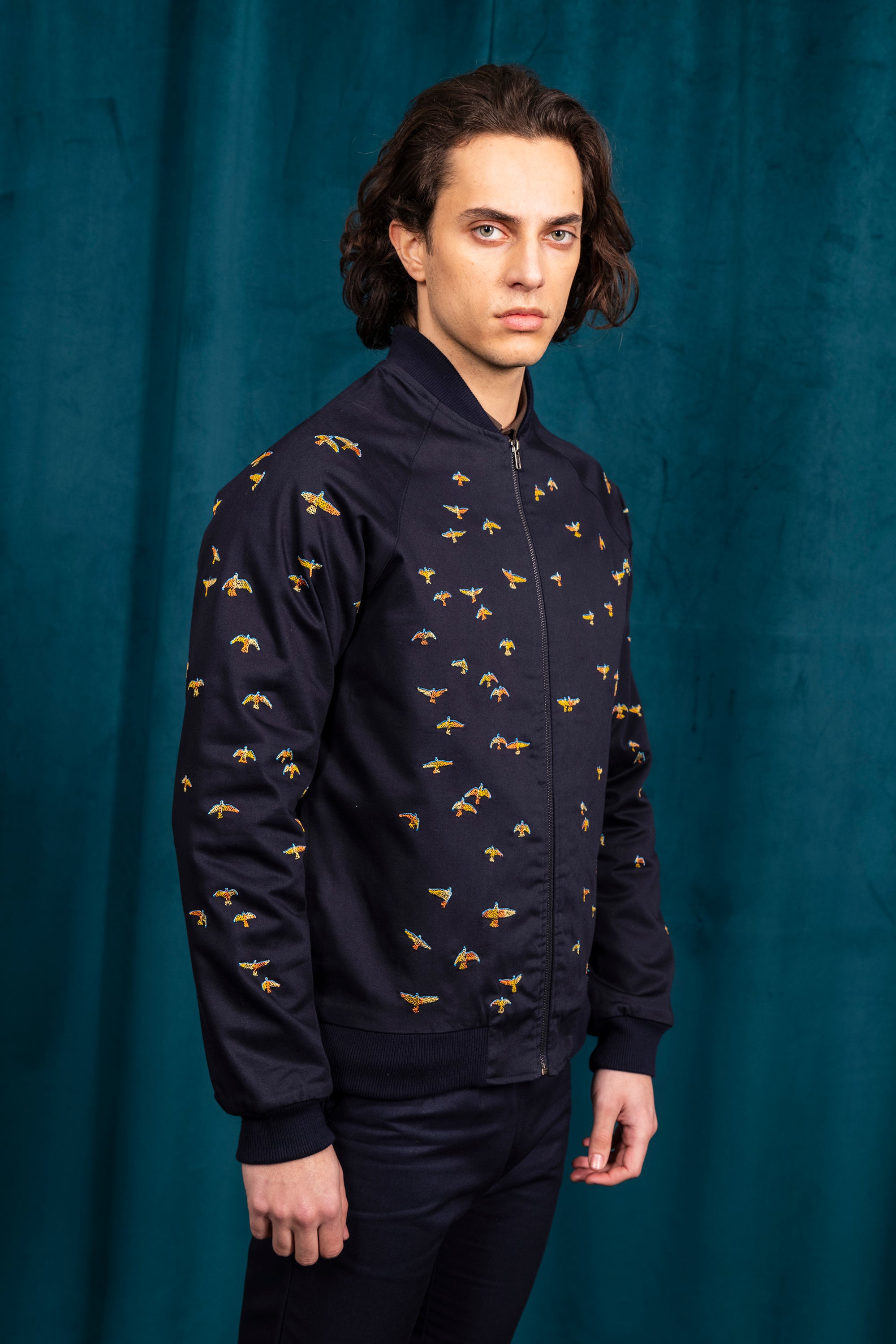 Men's navy blue coat with all-over bird embroidery
