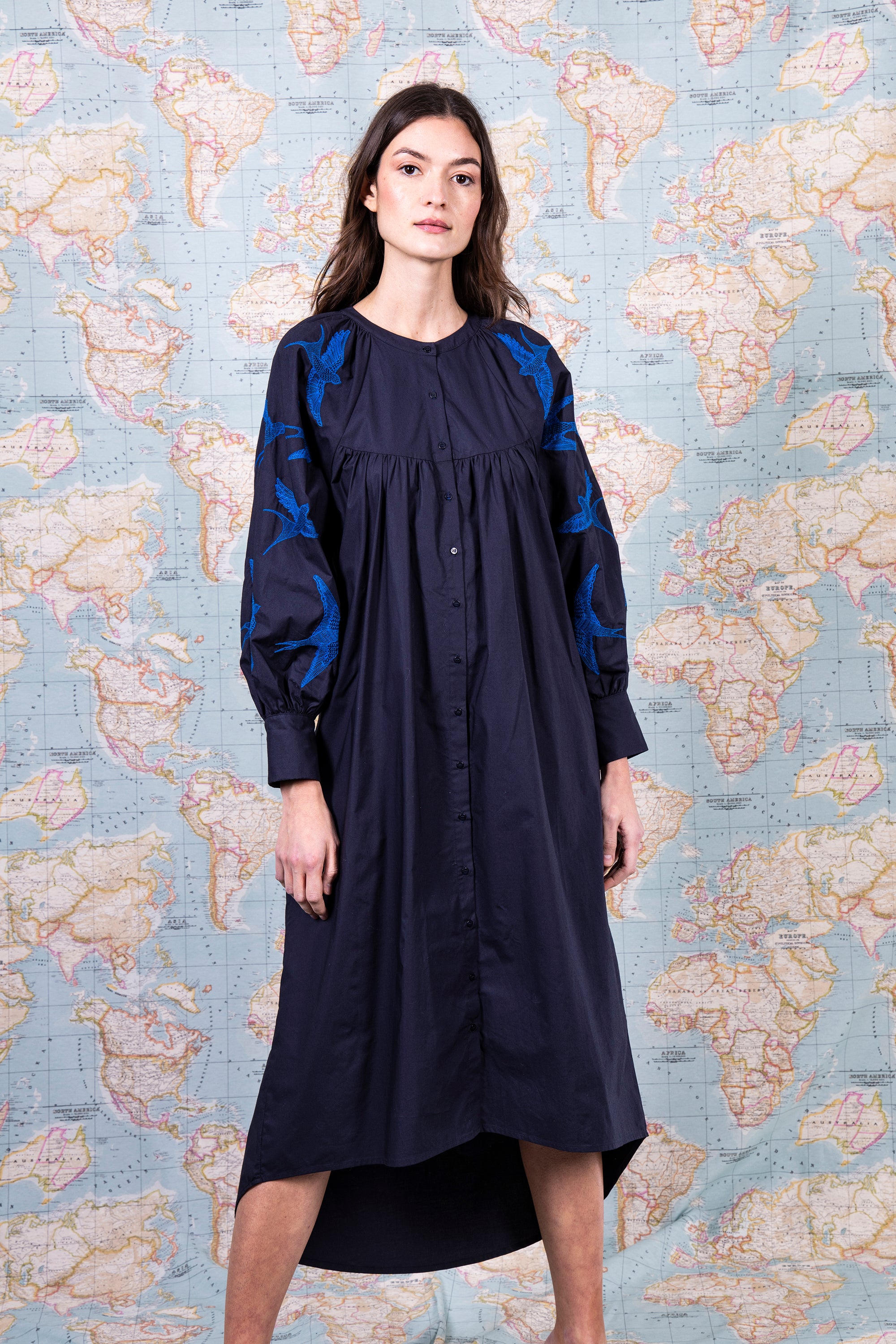 fluid and light mid-length dress Peruvian cotton woman artisanal embroidery navy blue and sapphire blue birds voluminous sleeves wide and flared cut