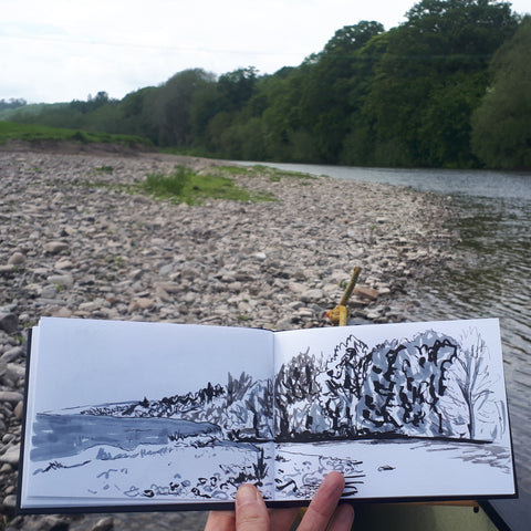 Sketching in a canoe by Alice Draws the Line, river wye May 2022