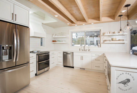 image of a white u shaped farmhouse kitchen
