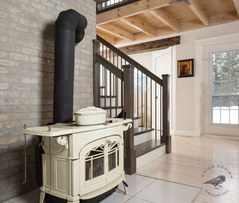 Image of wood burning stove with brick and new staircase