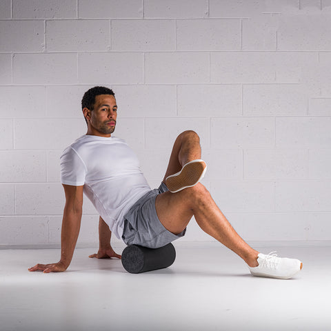 Man using a high density xpeed foam roller