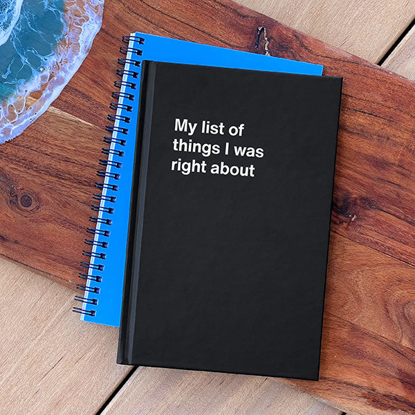 A black WTF Notebook titled 