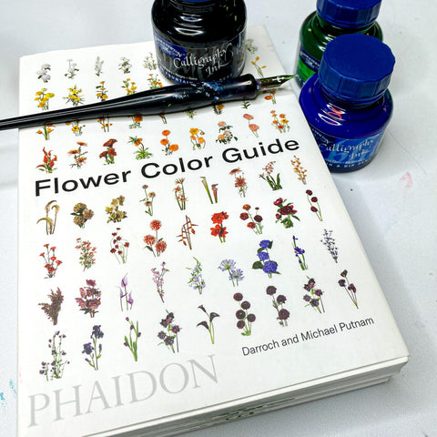 image of phaidon flower color guide and winsor newton calligraphy pen and ink