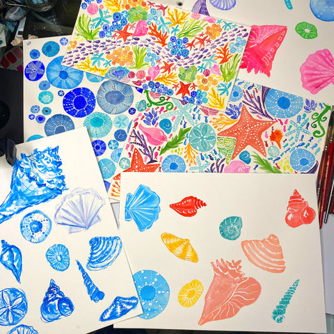 paintings with various multicolored watercolor seashells