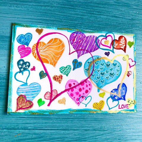 a watercolor postcard with many hearts of different size shapes and colors