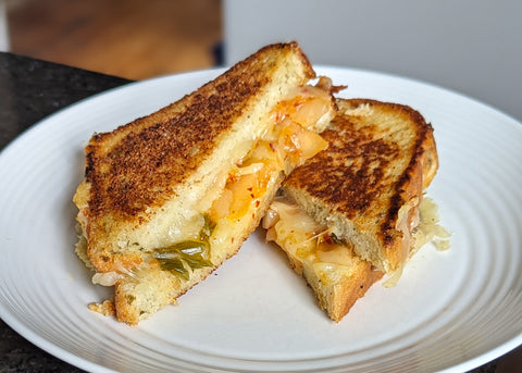 A crispy golden Kimchi Grilled Cheese Sandwich.