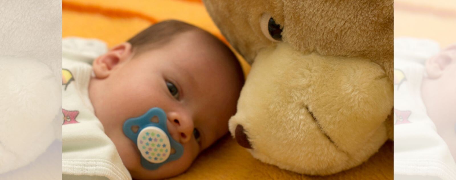 Infant with his Teddy Bear