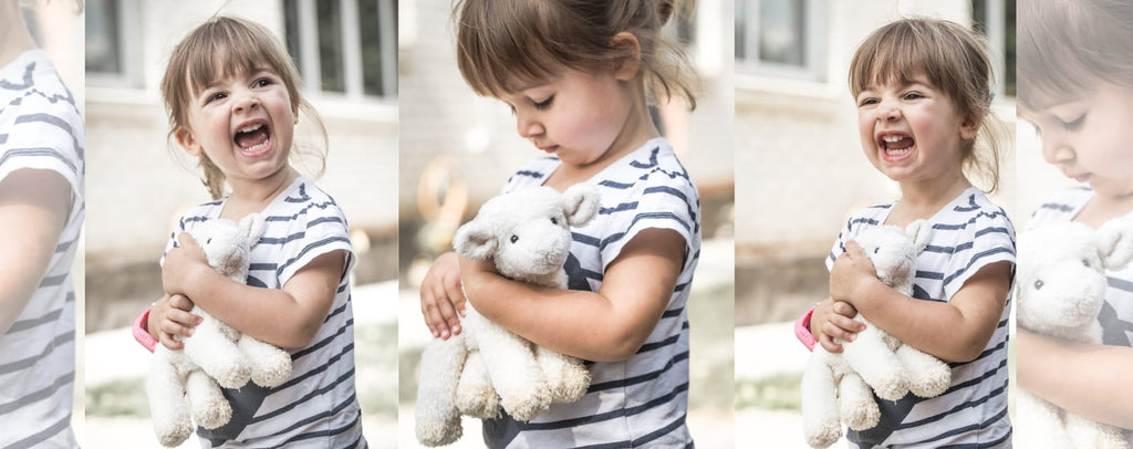 Little girl with her Aries soft toy