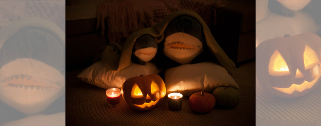 Scary stuffed animals and halloween pumpkin