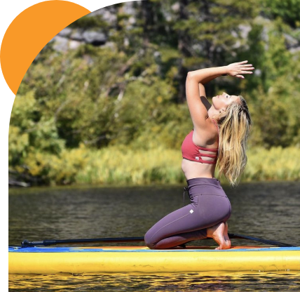 sup yoga on a paddleboard
