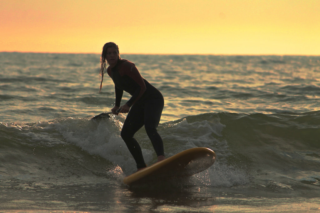 surfing a paddle board