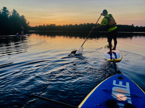 paddle boarding at night