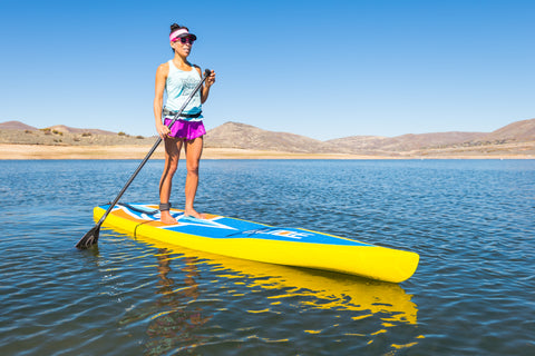 touring paddle board on a lake