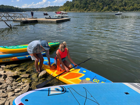 woman on inflatable paddle board