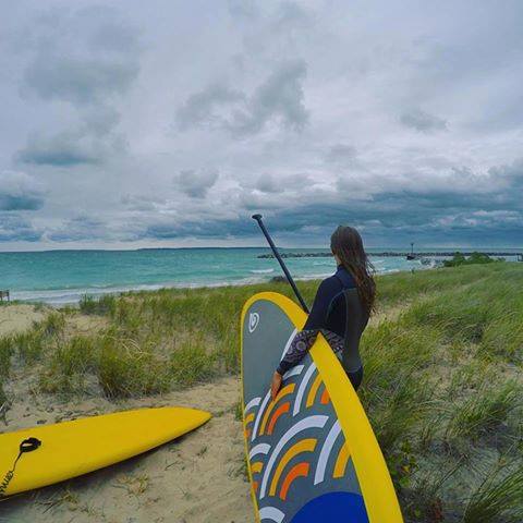 paddle boarding on a stormy day