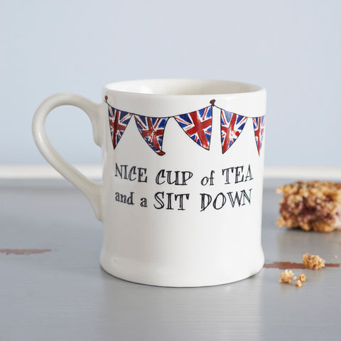 Nice cup of tea mug with Union Jack bunting makes a great gift to buy Brits in Australia