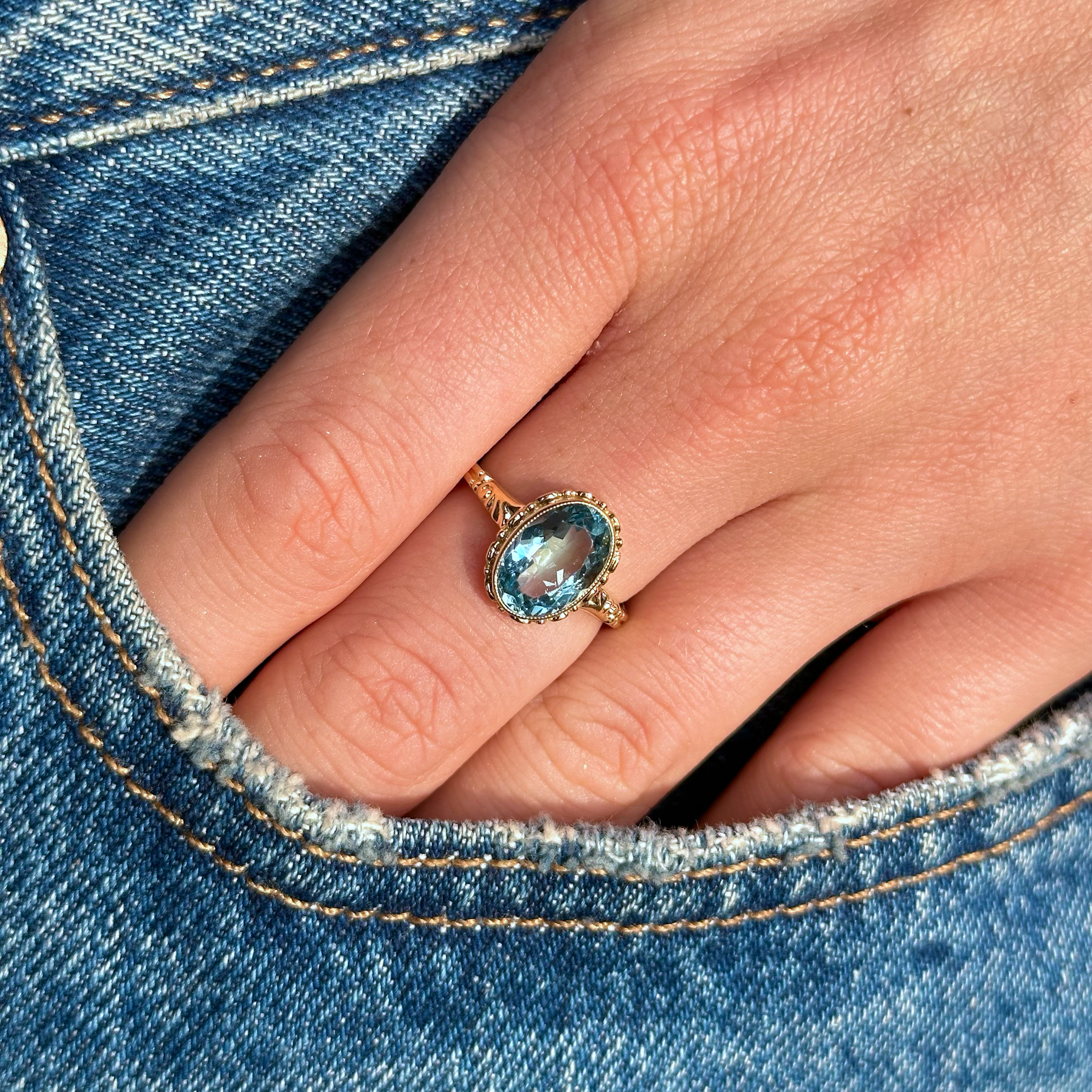 single stone oval-cut aquamarine ring
