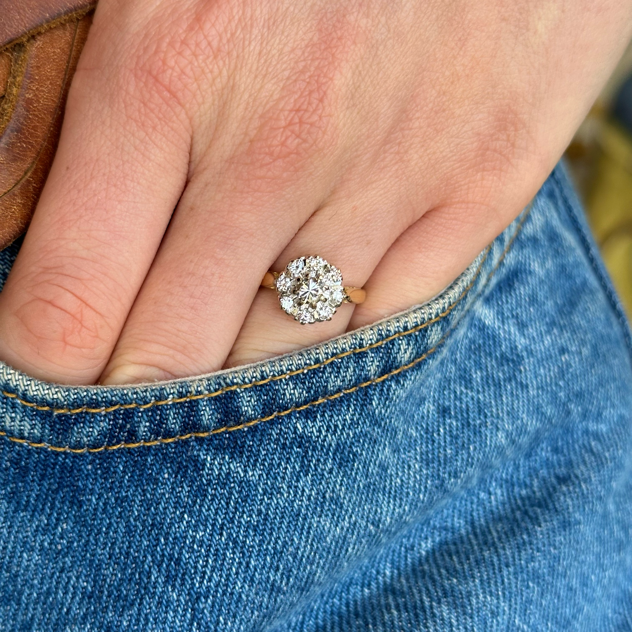 Antique, Edwardian Diamond Cluster Engagement Ring, 18ct Yellow Gold and Platinum worn on hand in pocket of jeans
