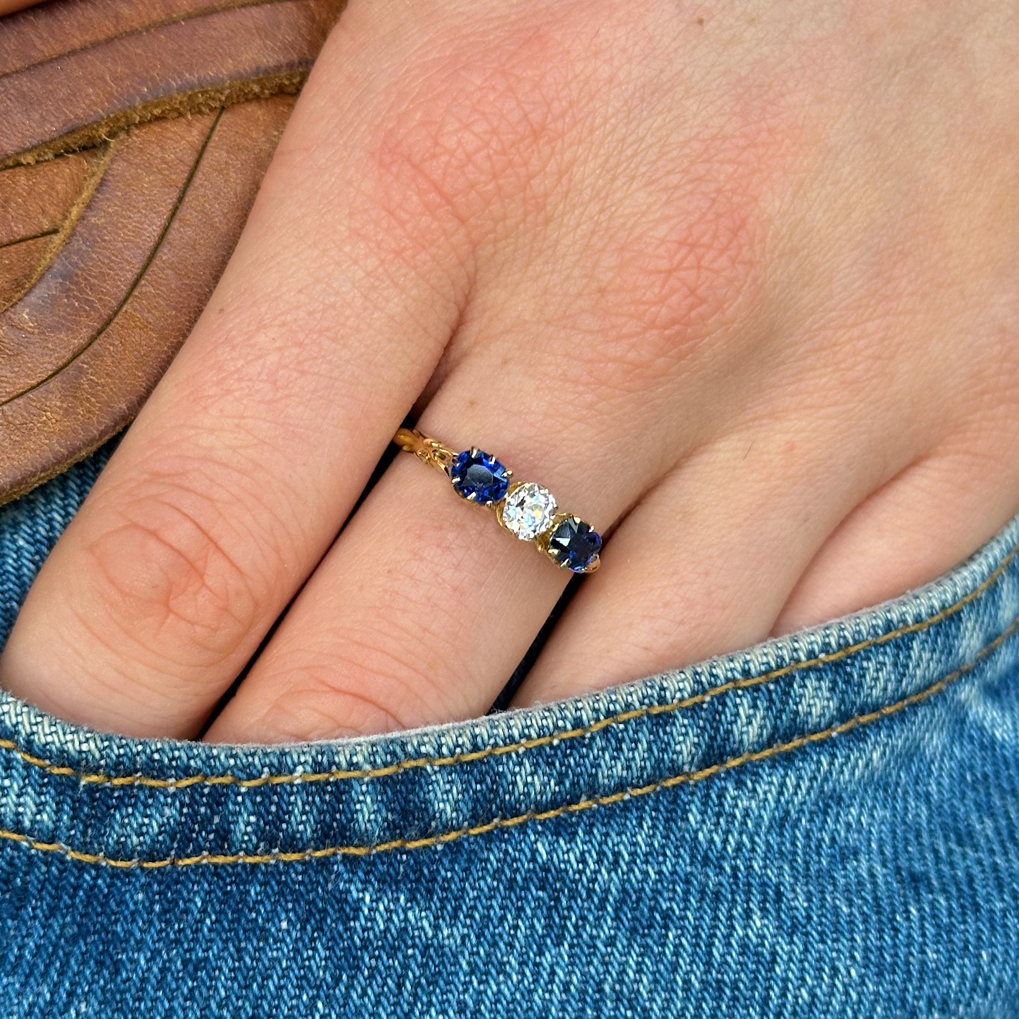 Antique, Edwardian Diamond and Sapphire Engagement Ring, 18ct Yellow Gold worn on hand in pocket of jeans