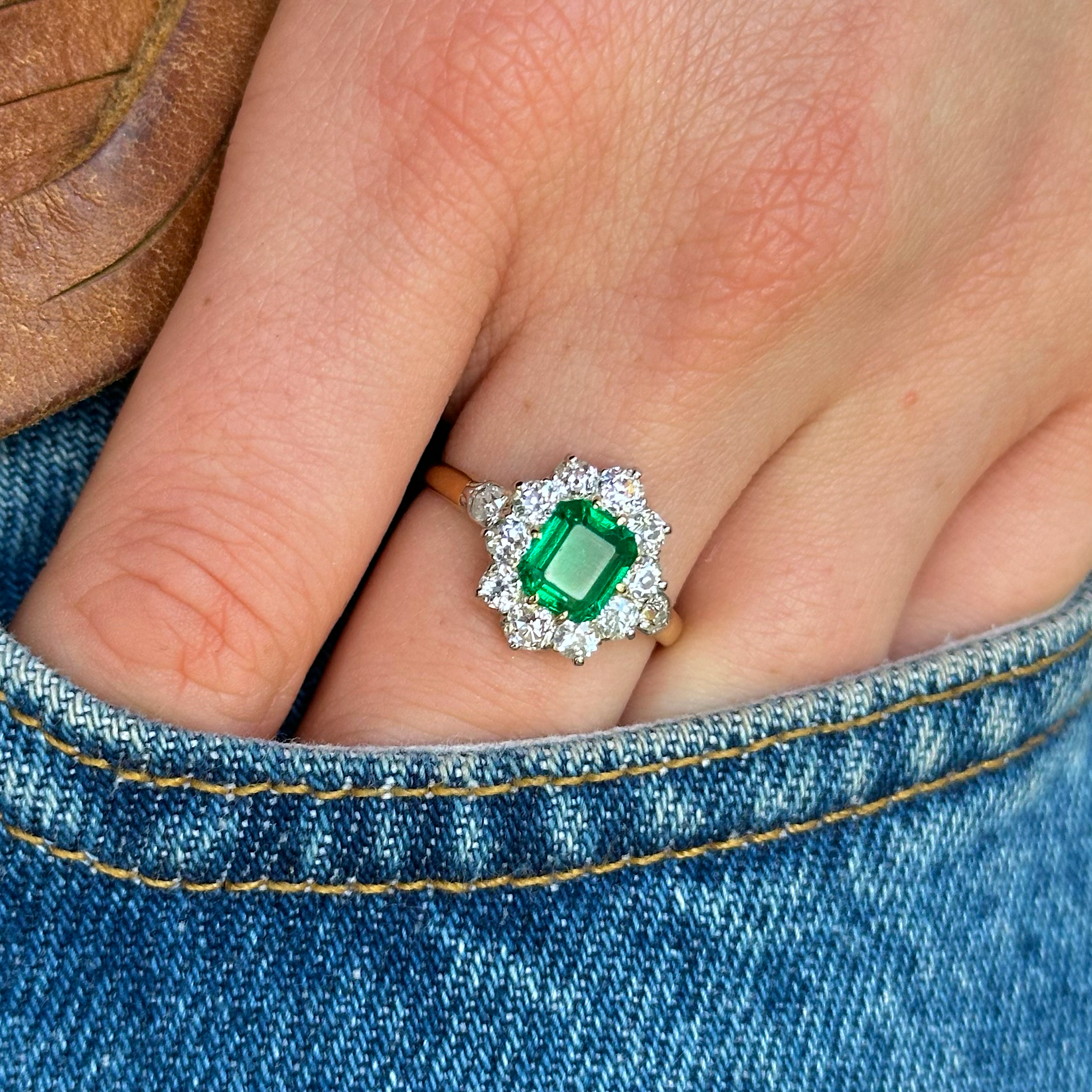 Antique, Edwardian Emerald and Diamond Engagement Ring, 18ct Yellow Gold and Platinum worn on hand in pocket of jeans