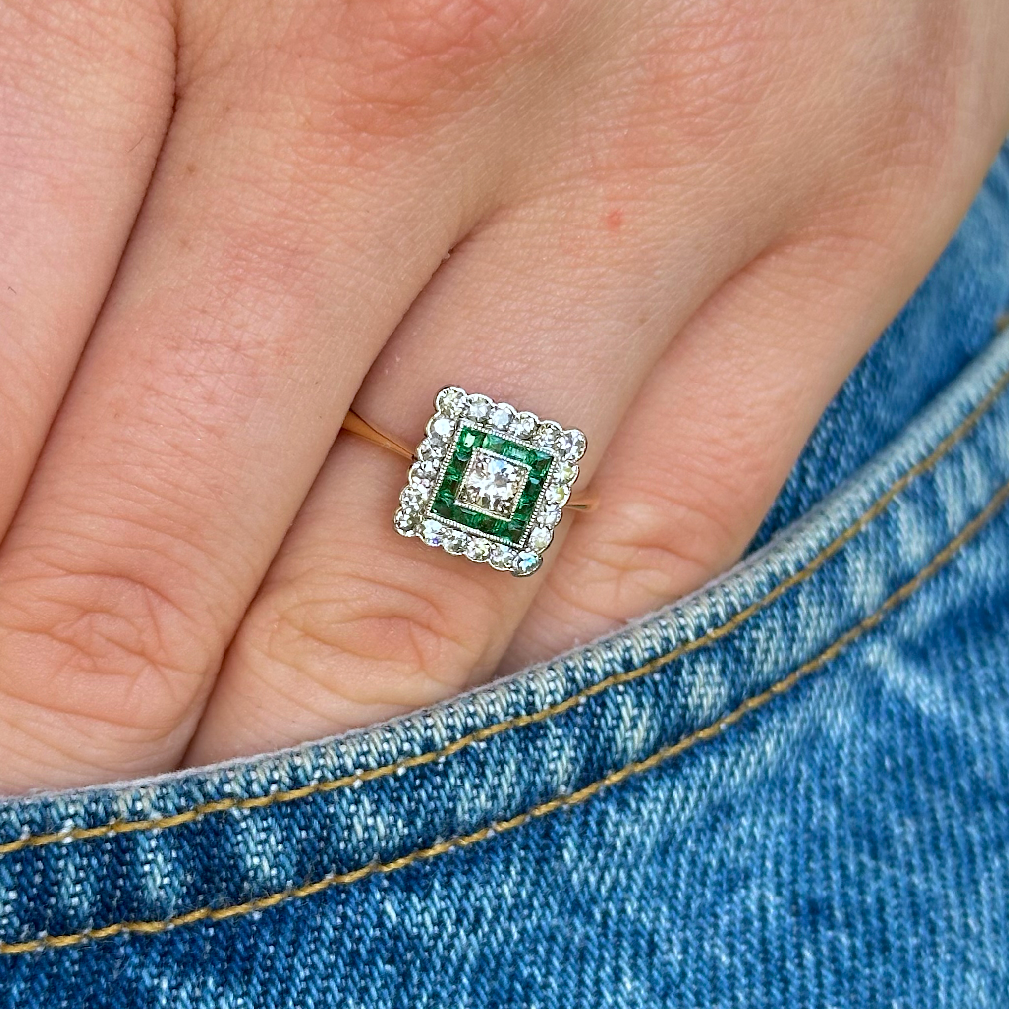 Antique, Emerald and Diamond Square Cluster Ring, 18ct Yellow Gold and Platinum worn on hand in pocket of jeans