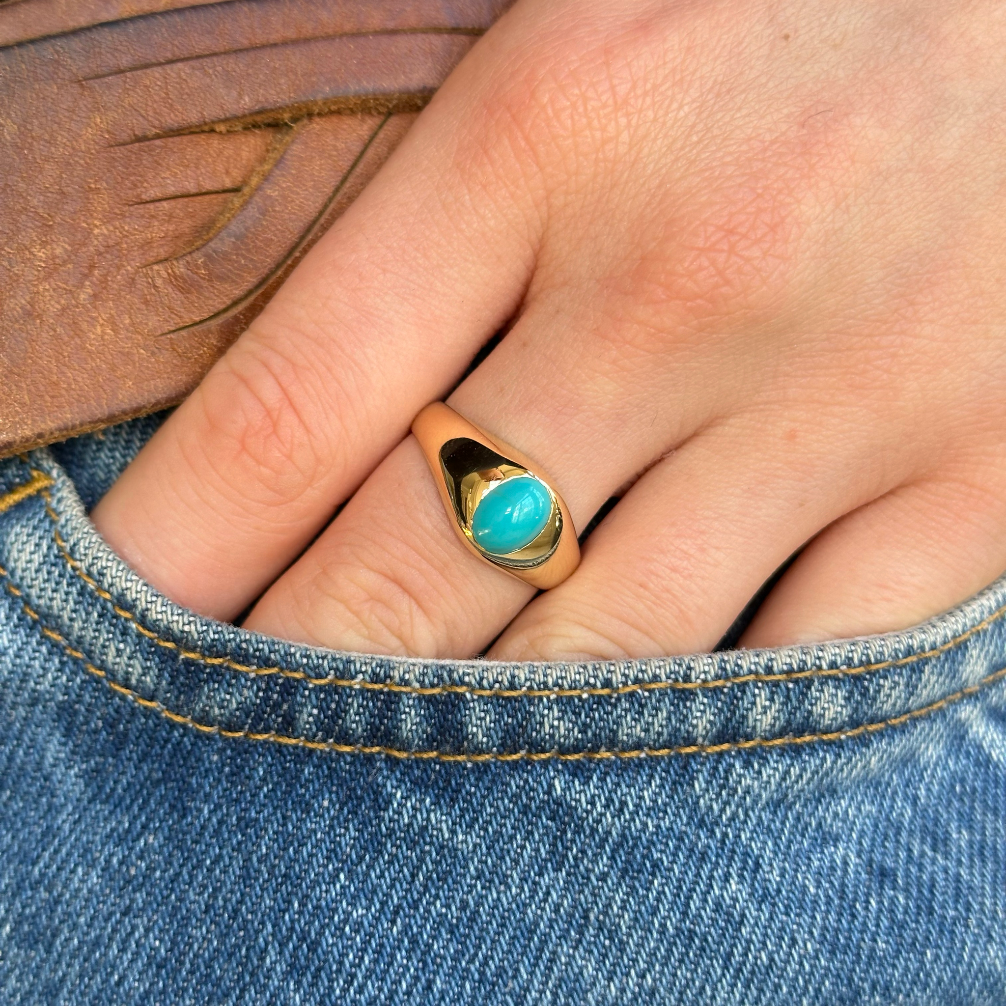 Antique, Single-Stone Turquoise Gypsy Ring, 18ct Yellow Gold worn on hand in pocket of jeans