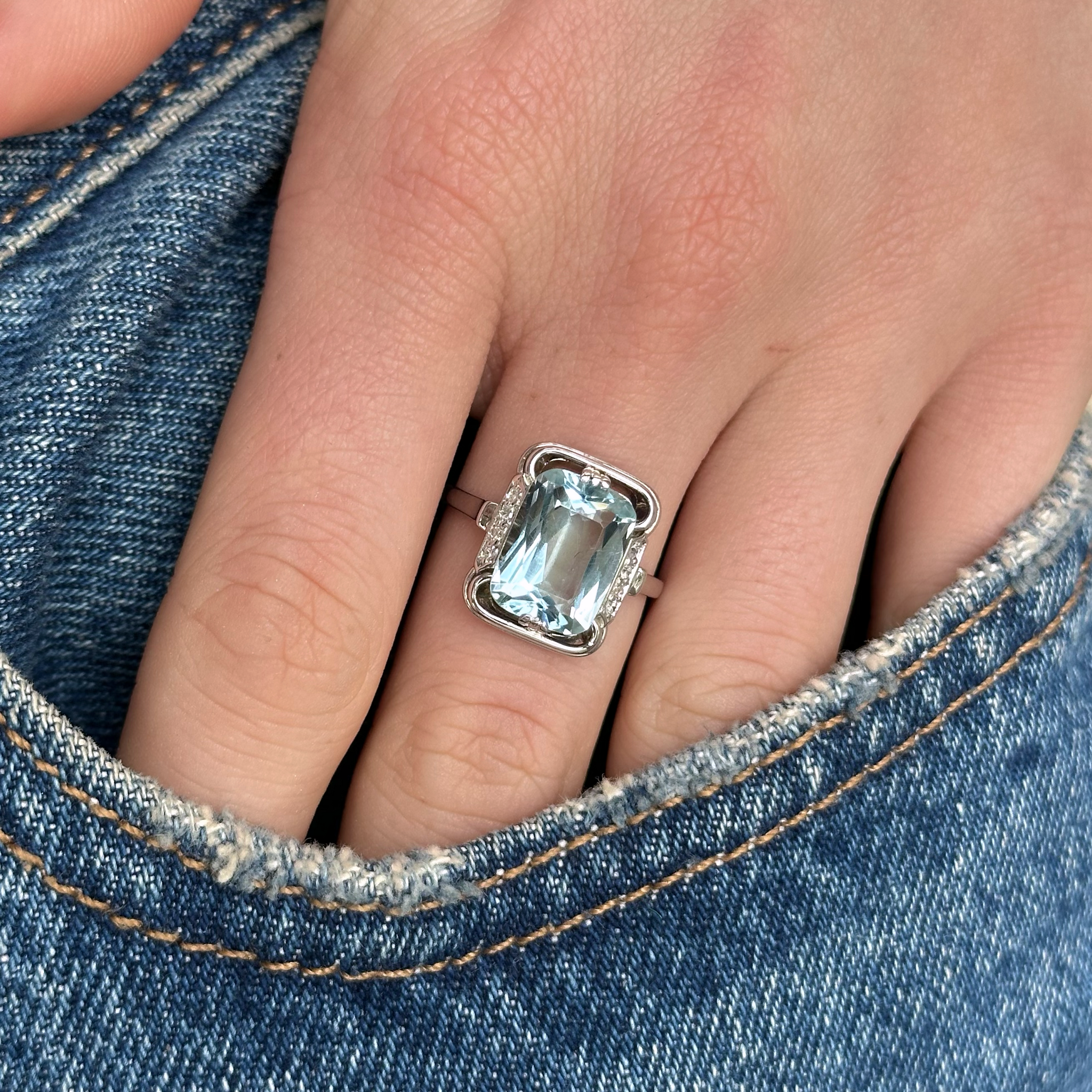 Vintage, Aquamarine and Diamond Ring, 18ct White Gold worn on hand in pocket of jeans