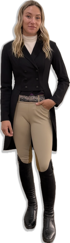 Young woman wearing a dark shadbelly coat and tan breeches