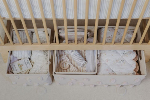 hideaway storage containers under baby crib 