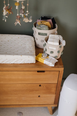 change station with storage basket and diaper pail