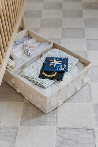 Under crib storage with carpet