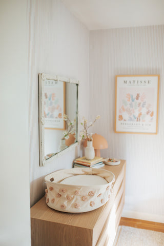 diaper changing basket on dresser