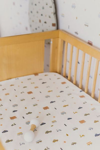 nursery crib with teething ring