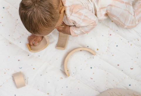 baby playing with block toys