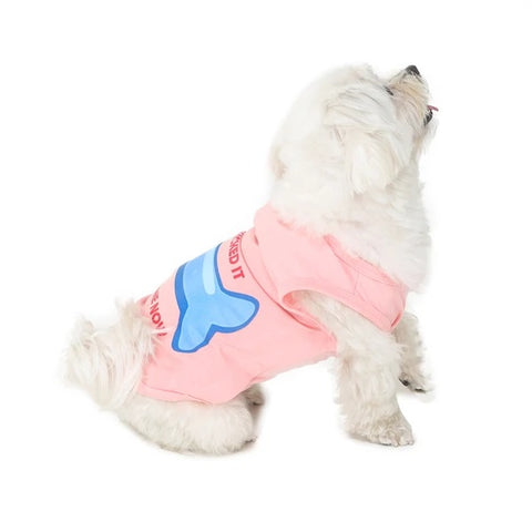 cute dog wearing pink-coloured sleeveless tshirt for dogs