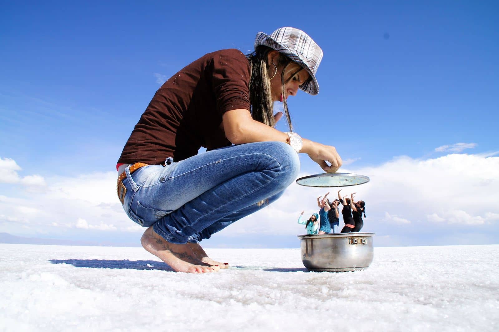 Best Forced Perspective Photography Examples for Photographers — People in Pot — Sunny 16