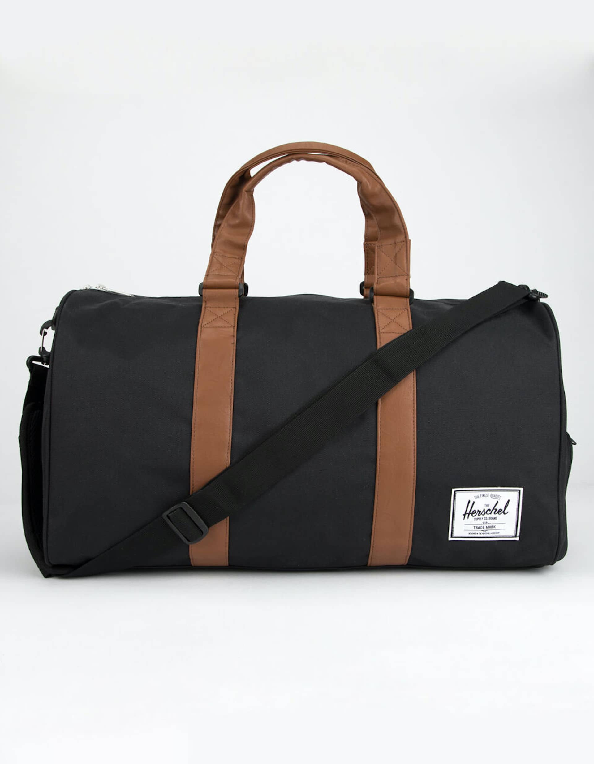 Is a Duffle Bag Considered a Carry On - HERSCHEL Supply - Novel Black & Tan Duffle Bag