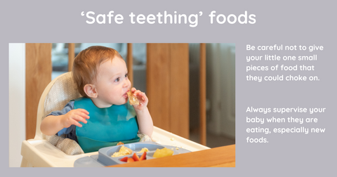 Image shows a baby in a high chair, eating safe foods