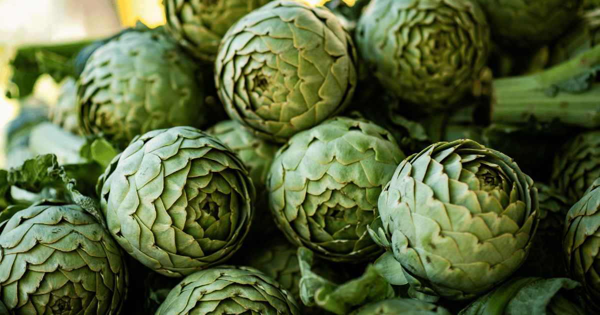 Bunches of artichokes at a farmer's market