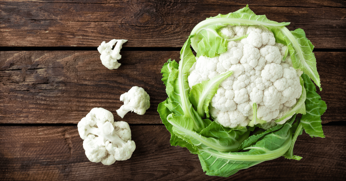 Cauliflower on a wooden background.