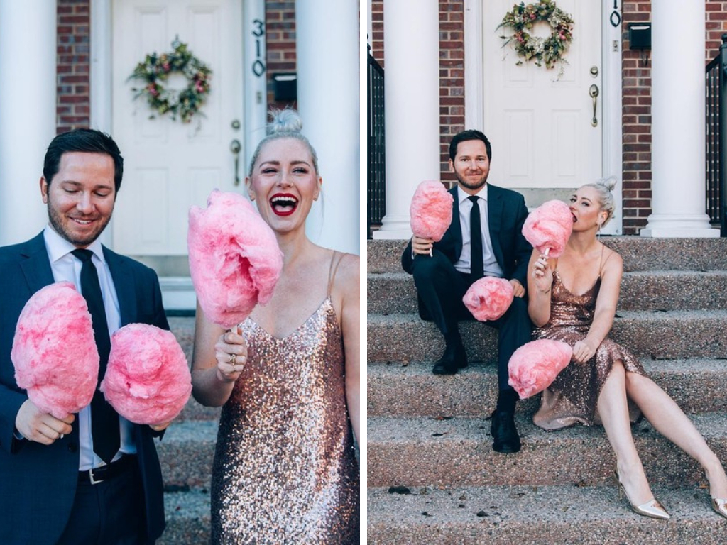 couple holding bright pink cotton candy